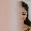 Bride getting ready at Lush Makeovers studio in Vijayawada with HD makeup.