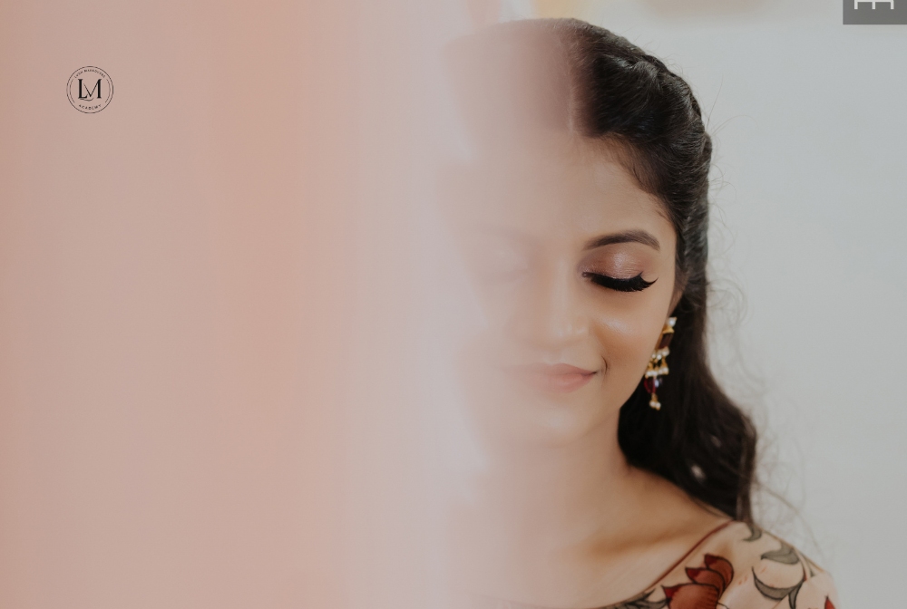 Bride getting ready at Lush Makeovers studio in Vijayawada with HD makeup.