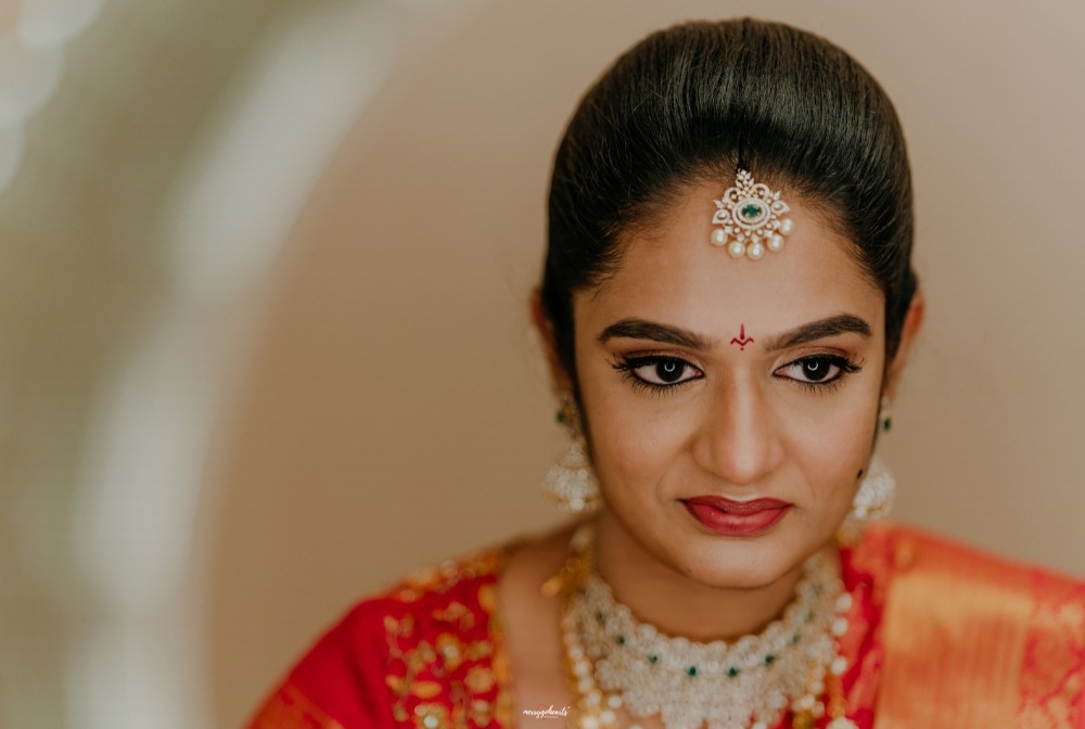 "Groom getting HD makeup done by a professional makeup artist in Vijayawada"